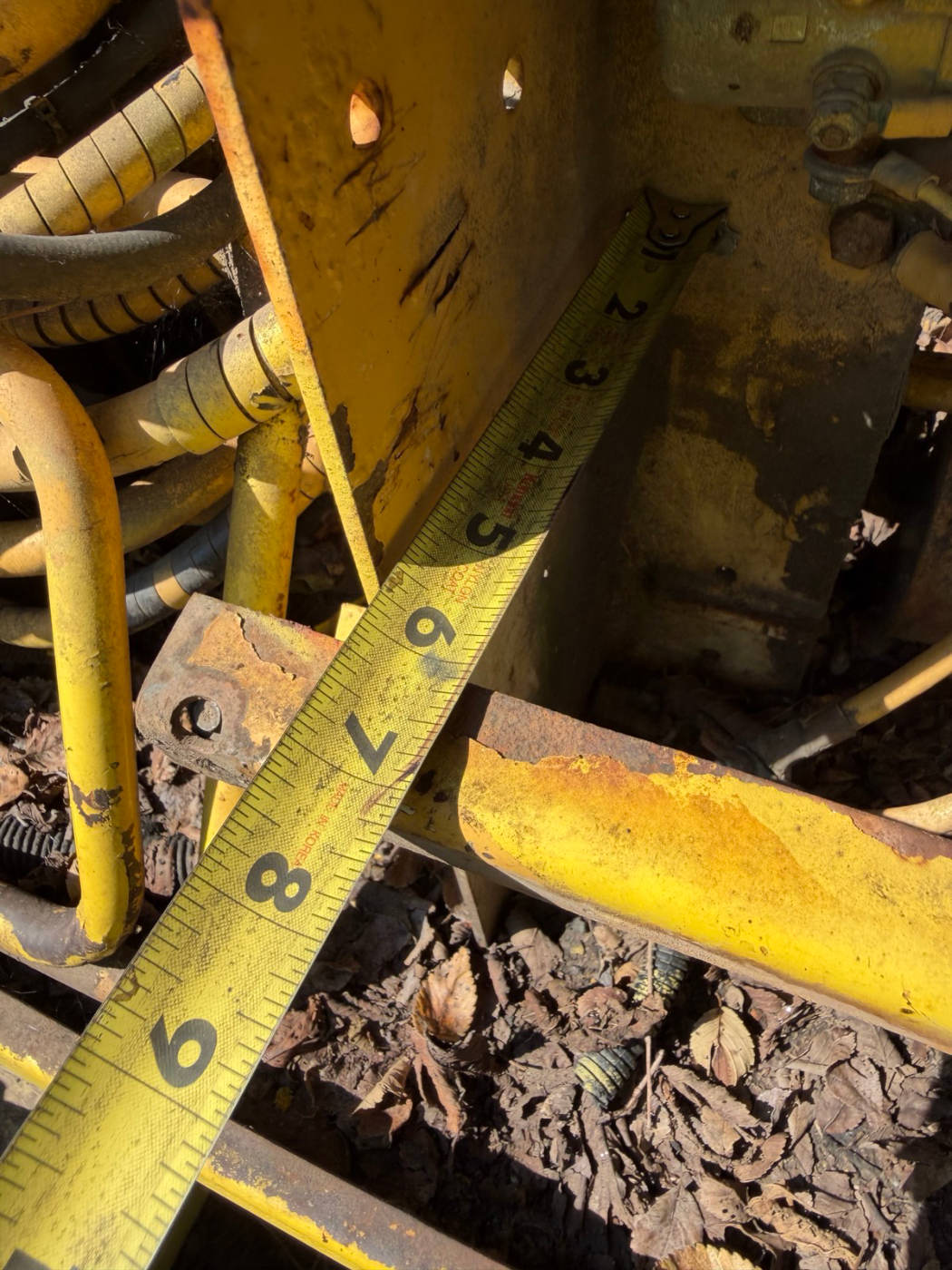 Tape measure showing the depth of the compartment