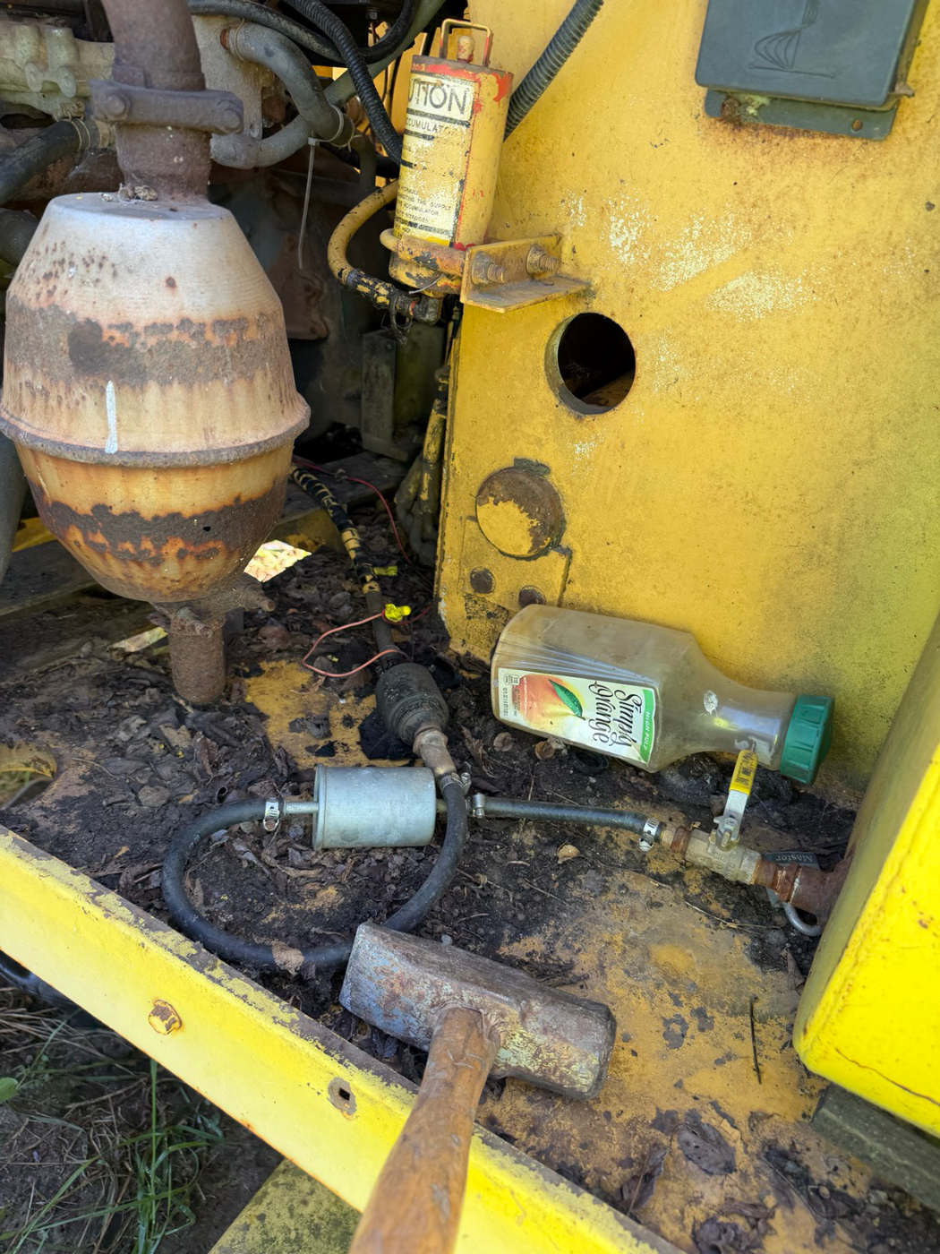 Inline fuel filter and separator canister in the line