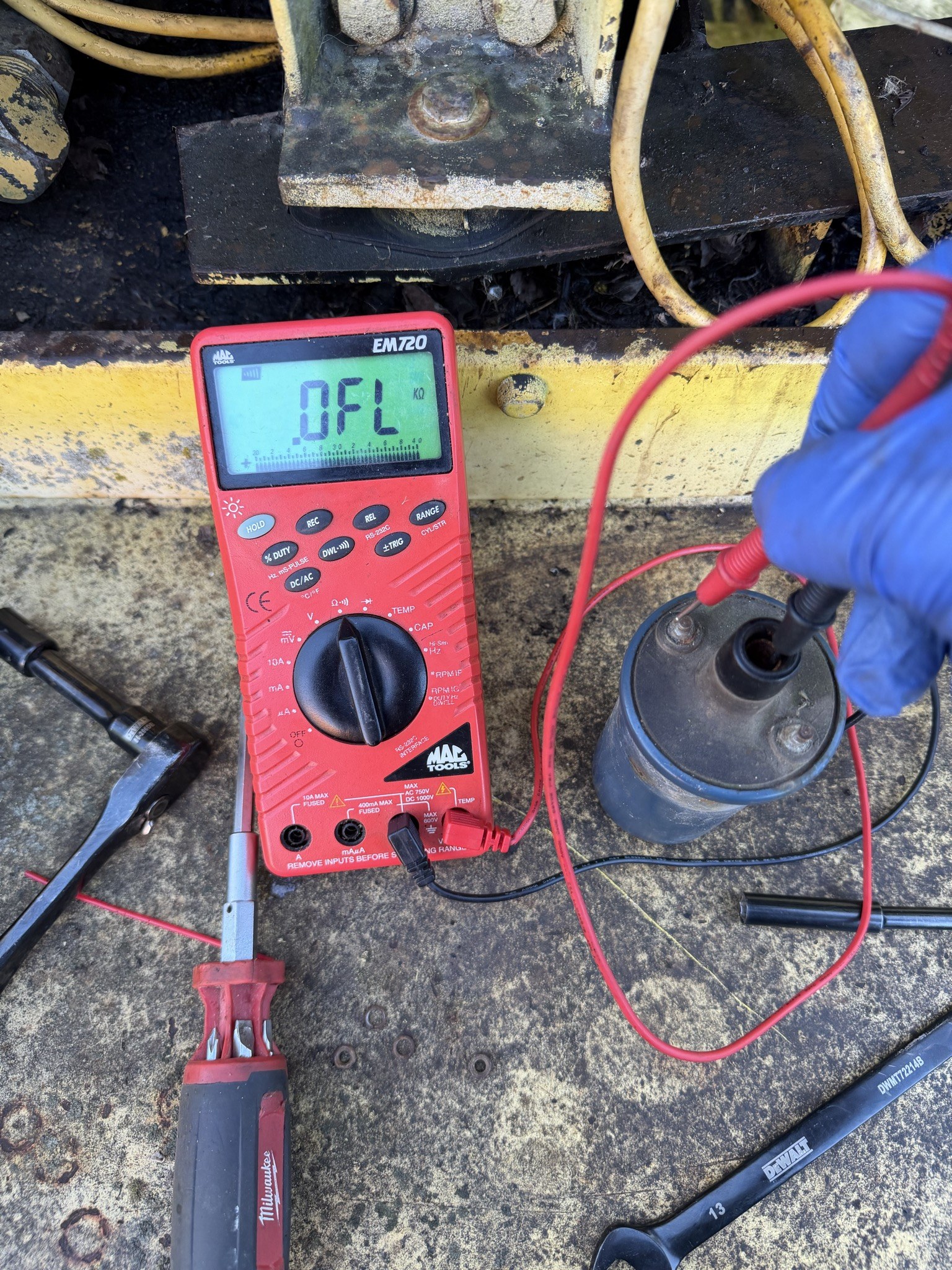 Meter reading OL with one probe in the HT tower and one on a low-tension terminal