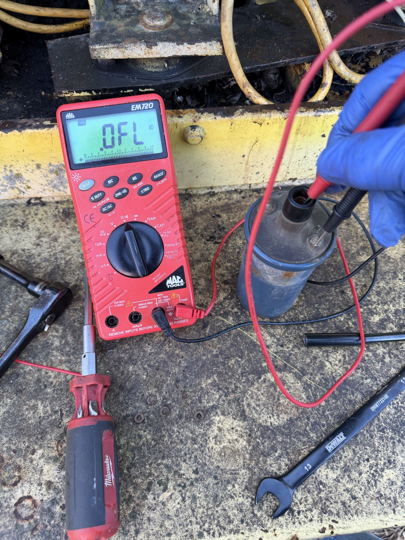 Meter reading OL again, probes on the HT tower and the other low-tension terminal