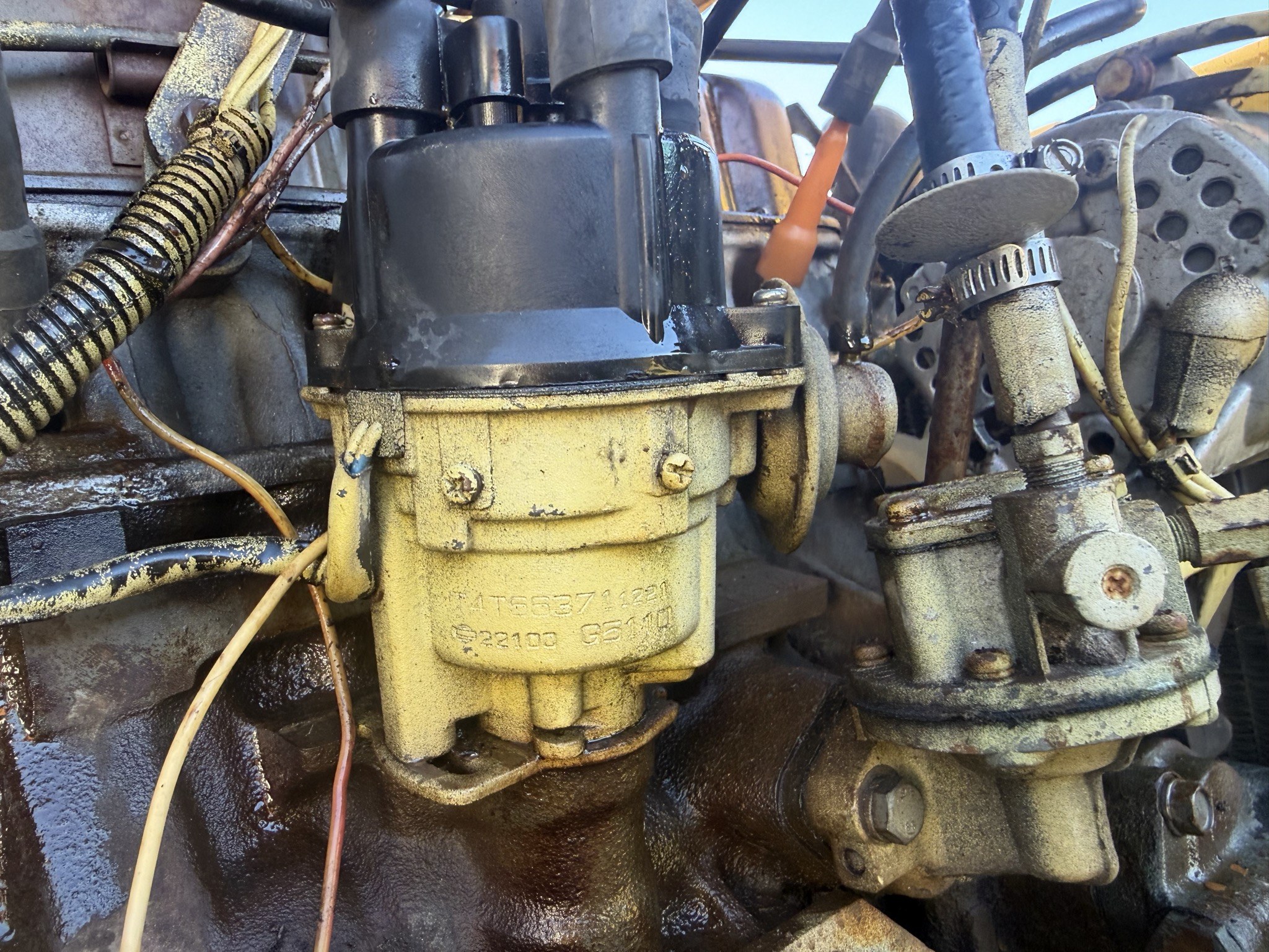 Distributor and fuel pump on the side of the block