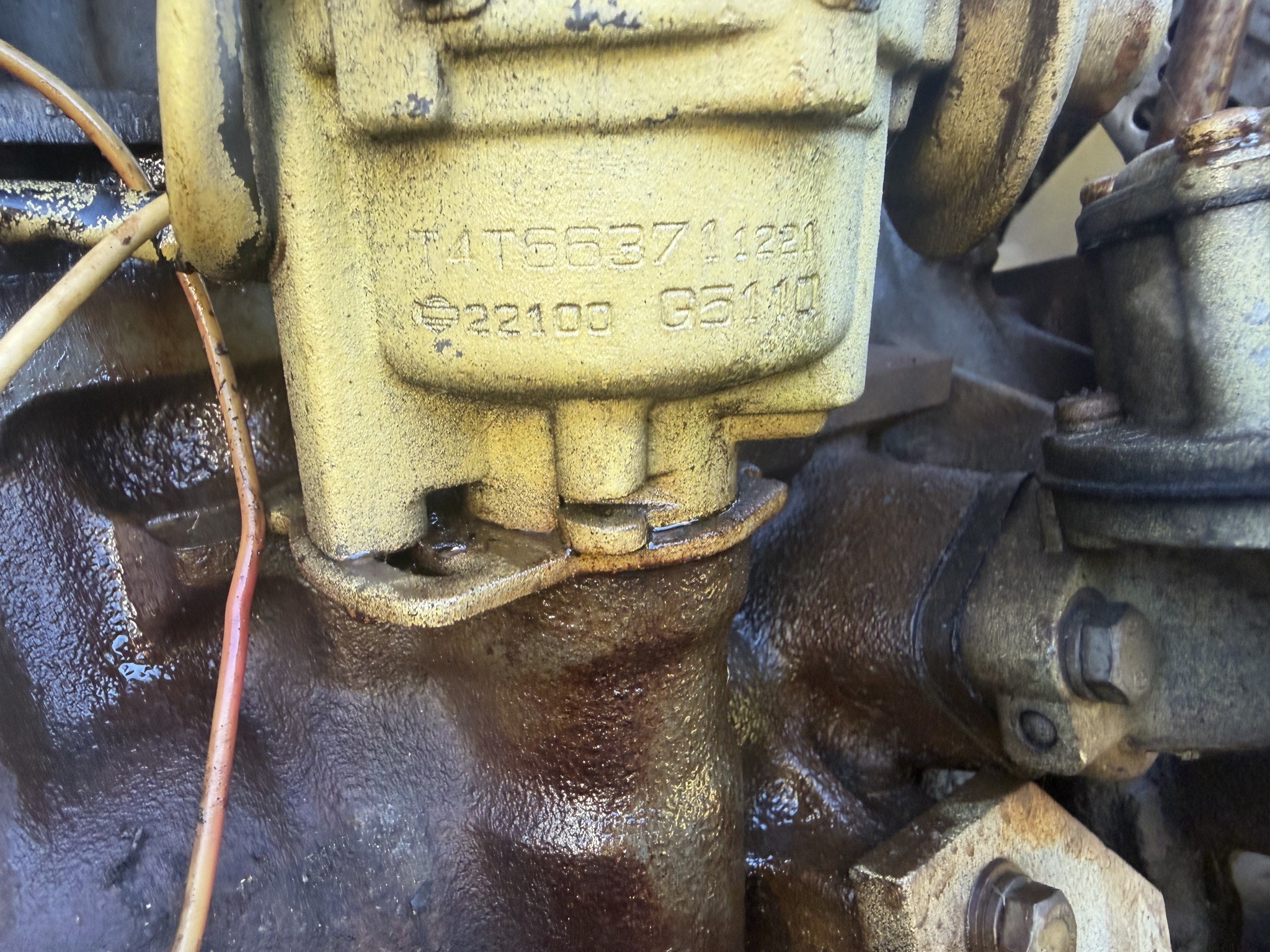 Distributor body casting, stamped T4T56371 above 22100 G5110