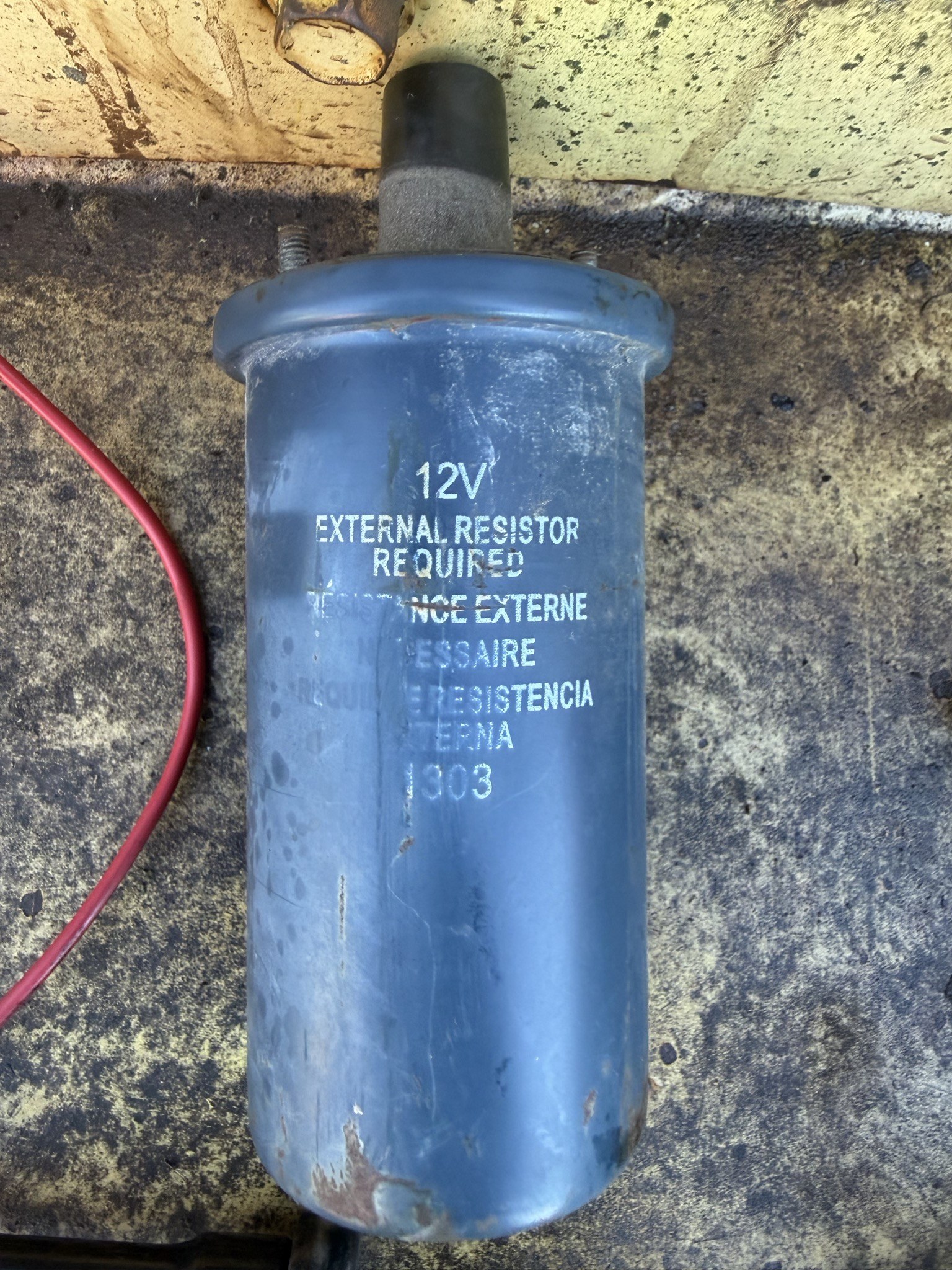Coil out of the machine, label reading 12V EXTERNAL RESISTOR REQUIRED